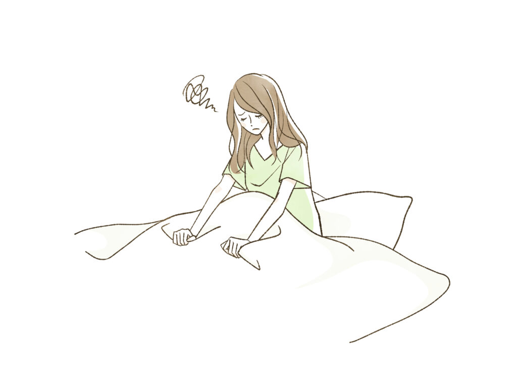つらそうに座る女性のイラスト